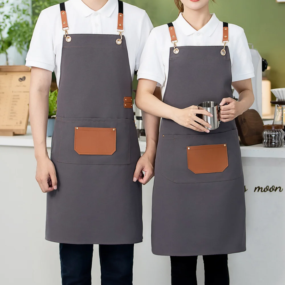 Ποδιά Με Τσέπη Polyester 64Χ78 Εκ. Γκρι Με Λεπτομέρειες Pu – Keskor 65700-5