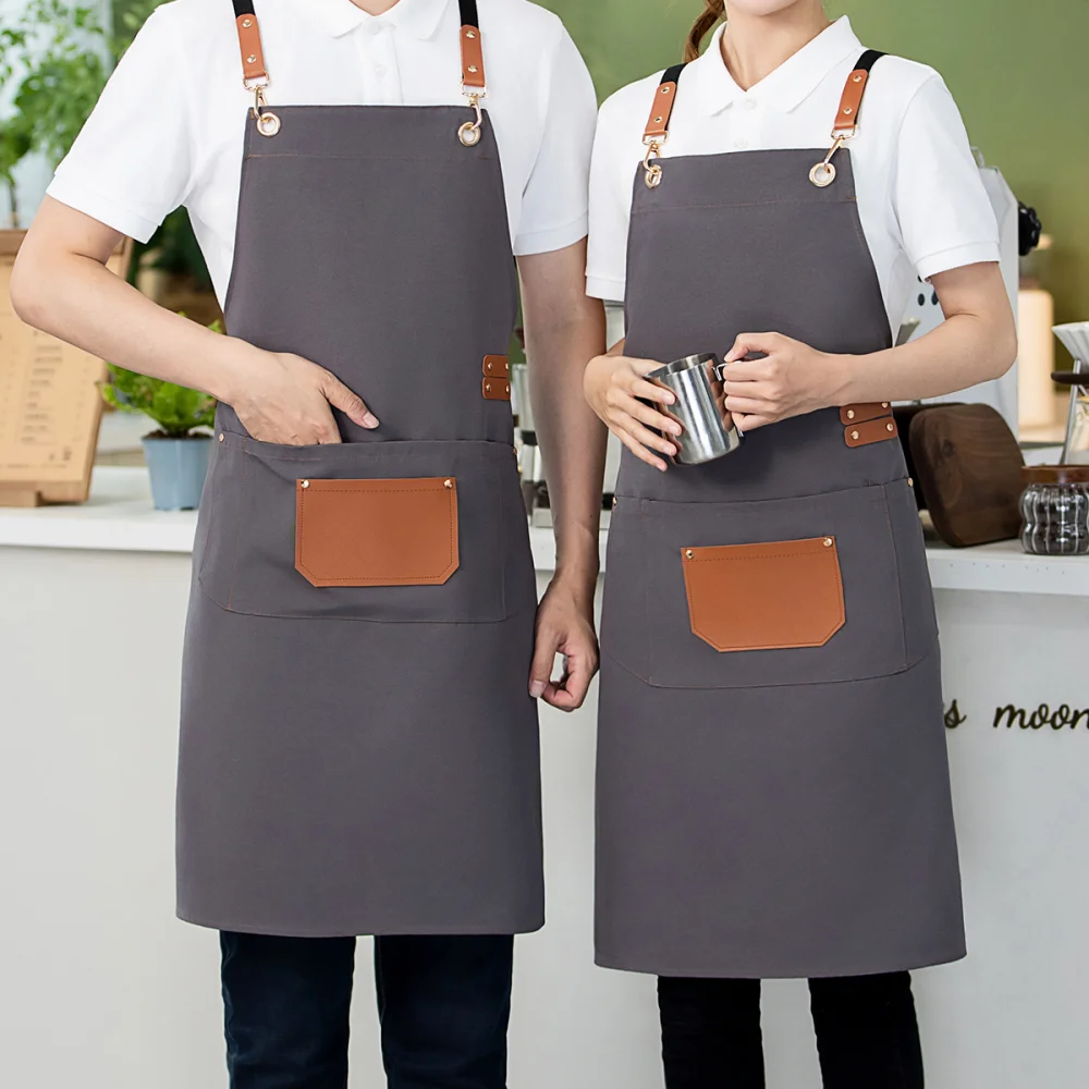 Ποδιά Με Τσέπη Polyester 64Χ78 Εκ. Γκρι Με Λεπτομέρειες Pu – Keskor 65700-5